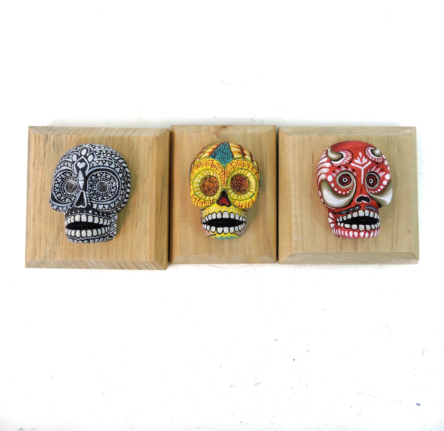 Set de tres calaveras de pared Rojo