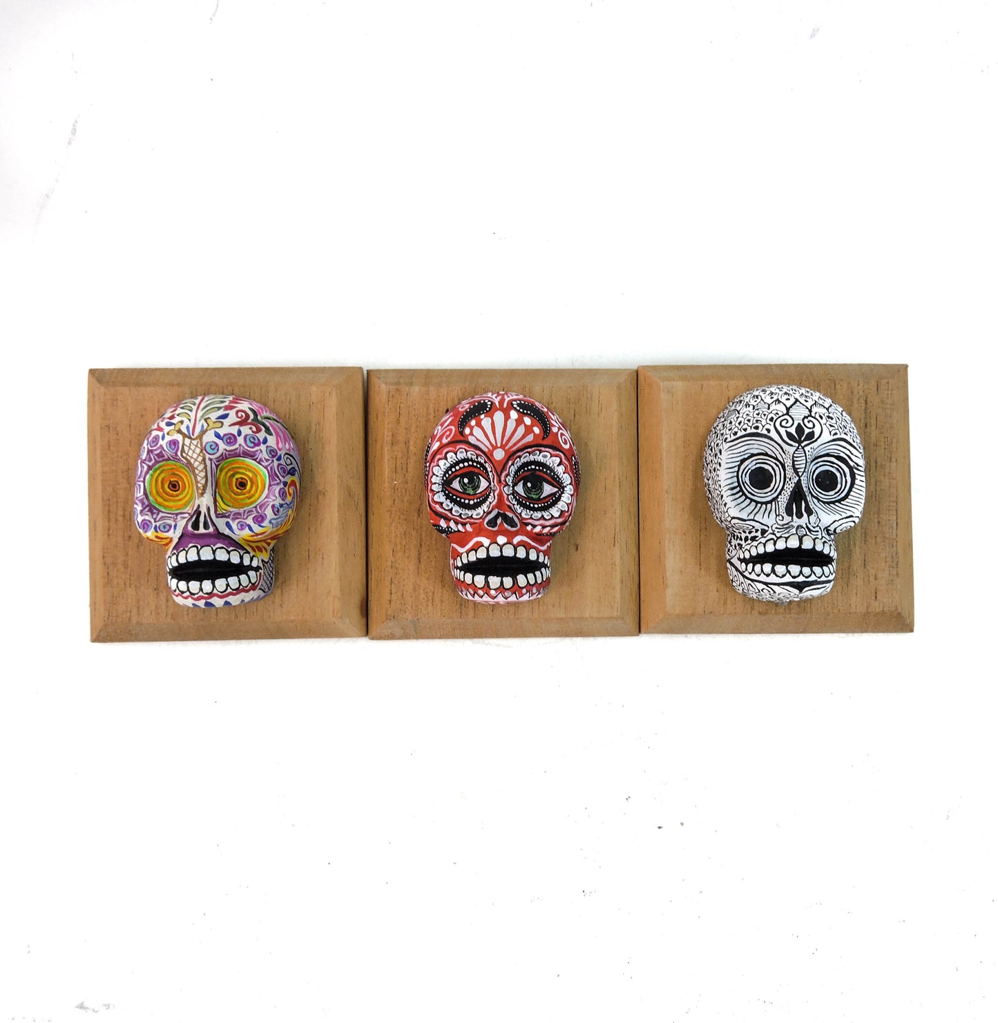 Set de tres calaveras de pared Alebrije