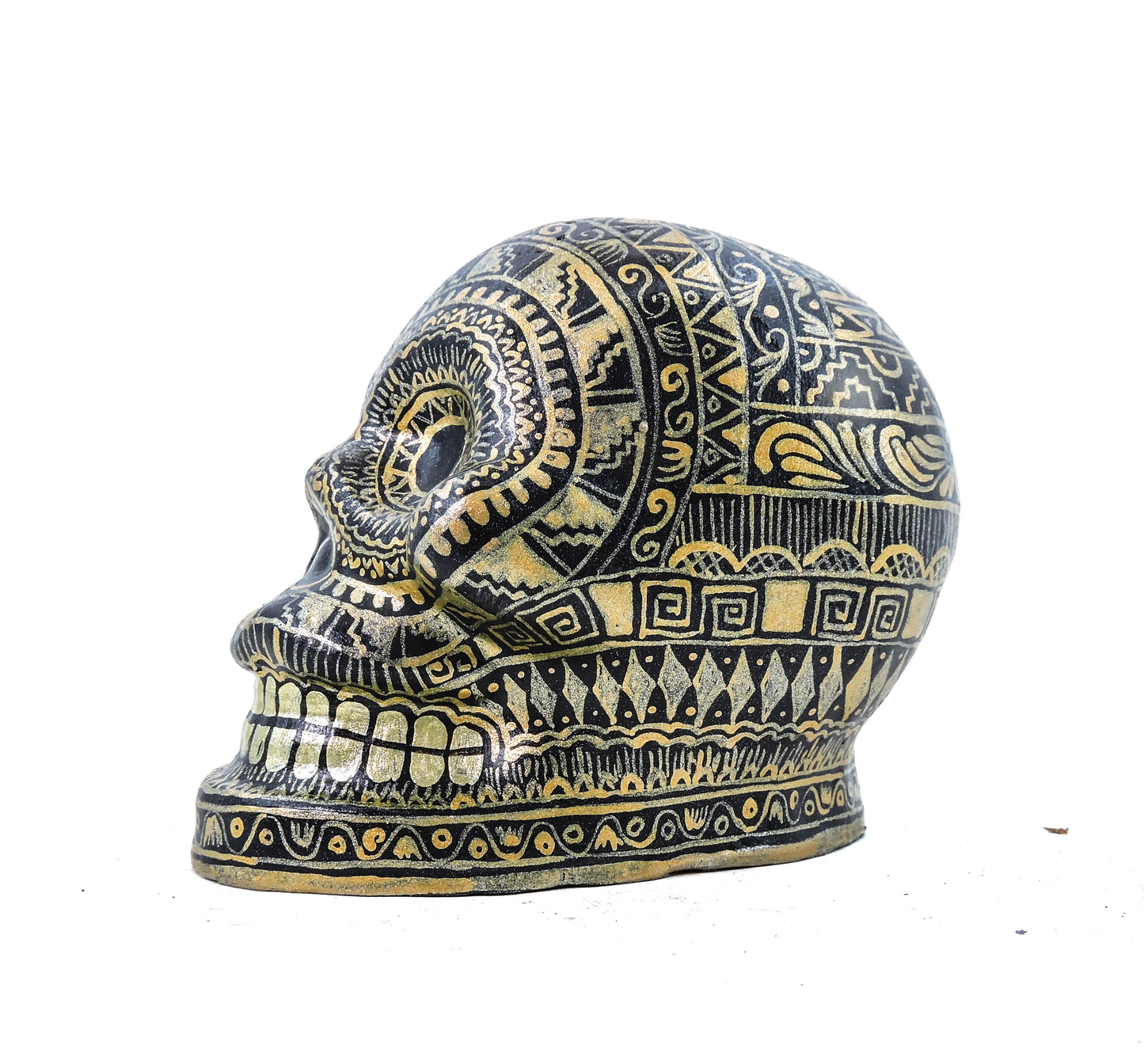 Craneo de Barro Dorado