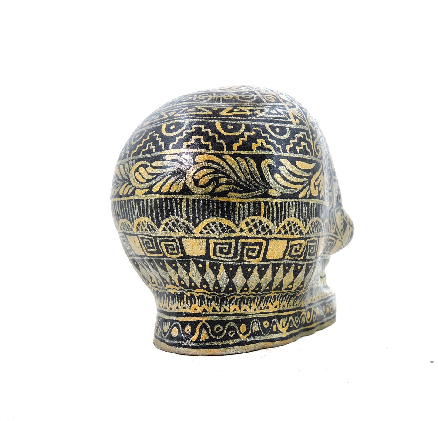 Craneo de Barro Dorado