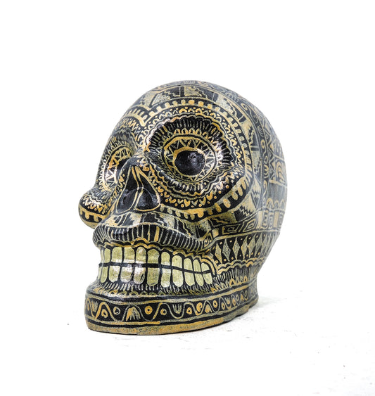 Craneo de Barro Dorado